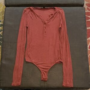 Olivaceous Dusty Rose Long Sleeve Bodysuit
